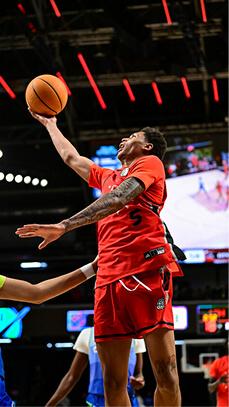 Basketball player dunking